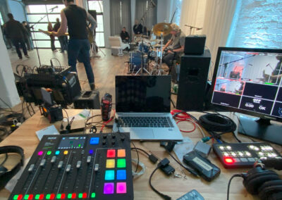 Video recording gear with band in background during a video production